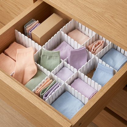 White drawer divider panels organizing colorful socks
